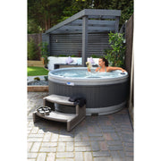 RotoSpa QuatroSpa 6 person hot tub in grey, side view