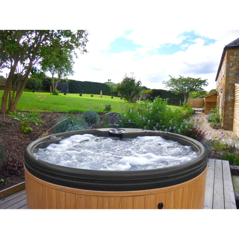 RotoSpa QuatroSpa 6 person hot tub in dark grey and teak, rear view