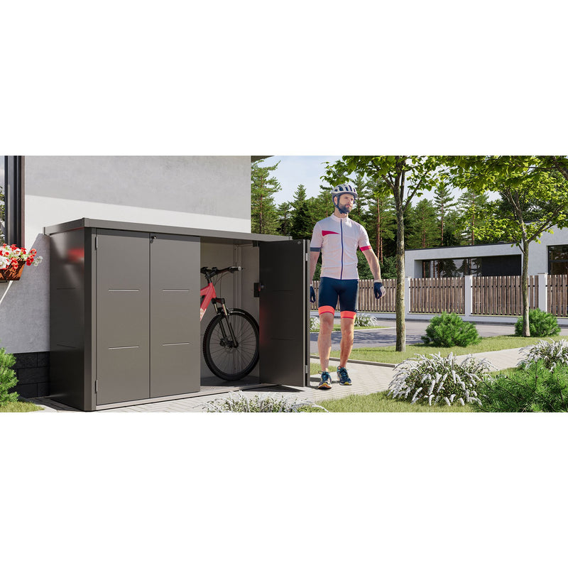 A Telluria Velotto beside a house with the bi-folding doors folded back and a bike inside, showing how the store sits against a wall in a side passage