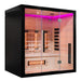 miracle sauna 4 person Infrared sauna with wooden interior and black exterior, illuminated by pink light.