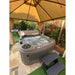 RotoSpa DuraSpa S380 Ultra hot tub in use outdoors