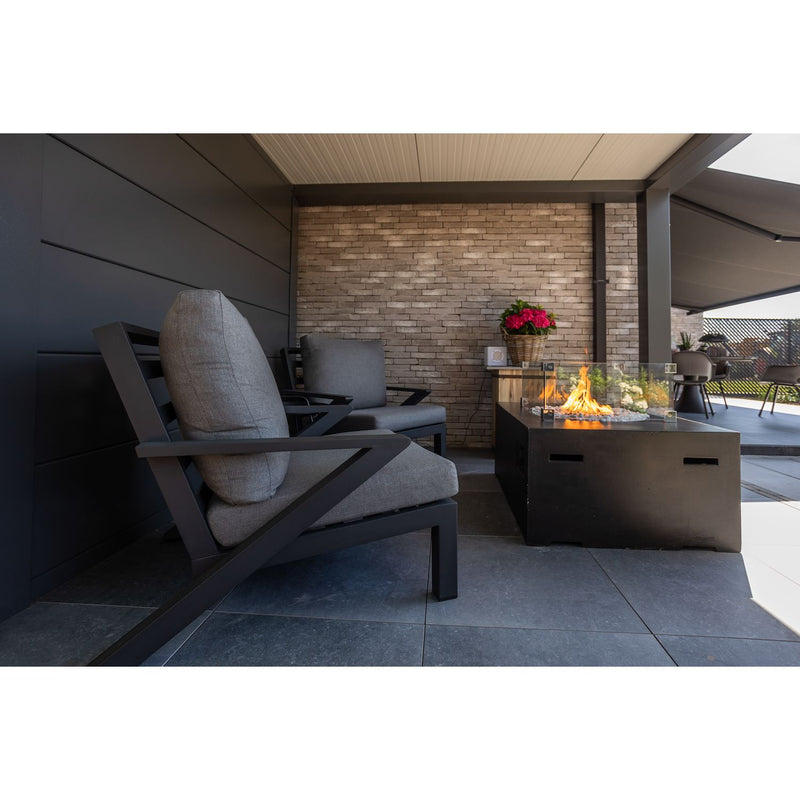 Telluria Luminato 2424 steel garden room in anthracite, installed in a customer's garden alongside an Open Lounge canopy, which is not included