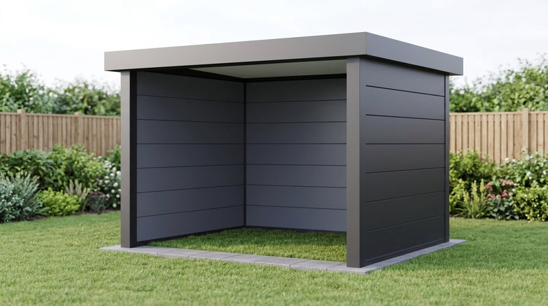 Telluria Singolo 3630 steel garden lounge in anthracite standing on a lawn, the open front facing planted borders and a timber fence, showing how 10.7 square metres of covered space sits in a garden