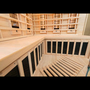 Miracle 4 person corner sauna interior with benches