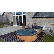 RotoSpa QuatroSpa 6 person hot tub installed at a customer's home