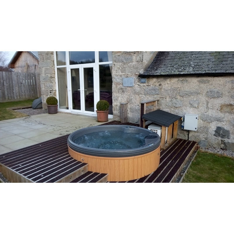 RotoSpa QuatroSpa 6 person hot tub installed at a customer's home