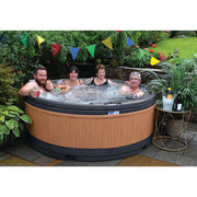 People relaxing in the RotoSpa QuatroSpa 6 person hot tub