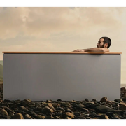 Man sitting in Temperd commercial cold plunge
