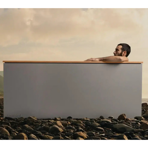 Man sitting in Temperd commercial cold plunge
